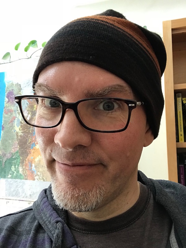 Keith Olson with map